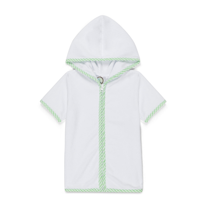 White baby poncho with green trim on a white background
