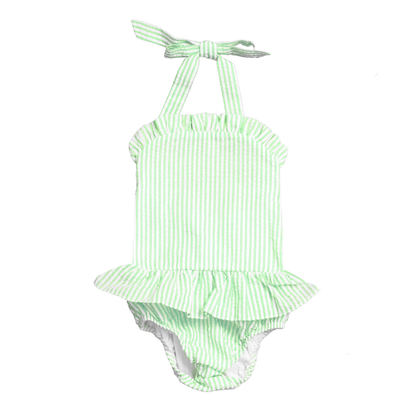 Green and white striped baby romper with ruffled details on a white background