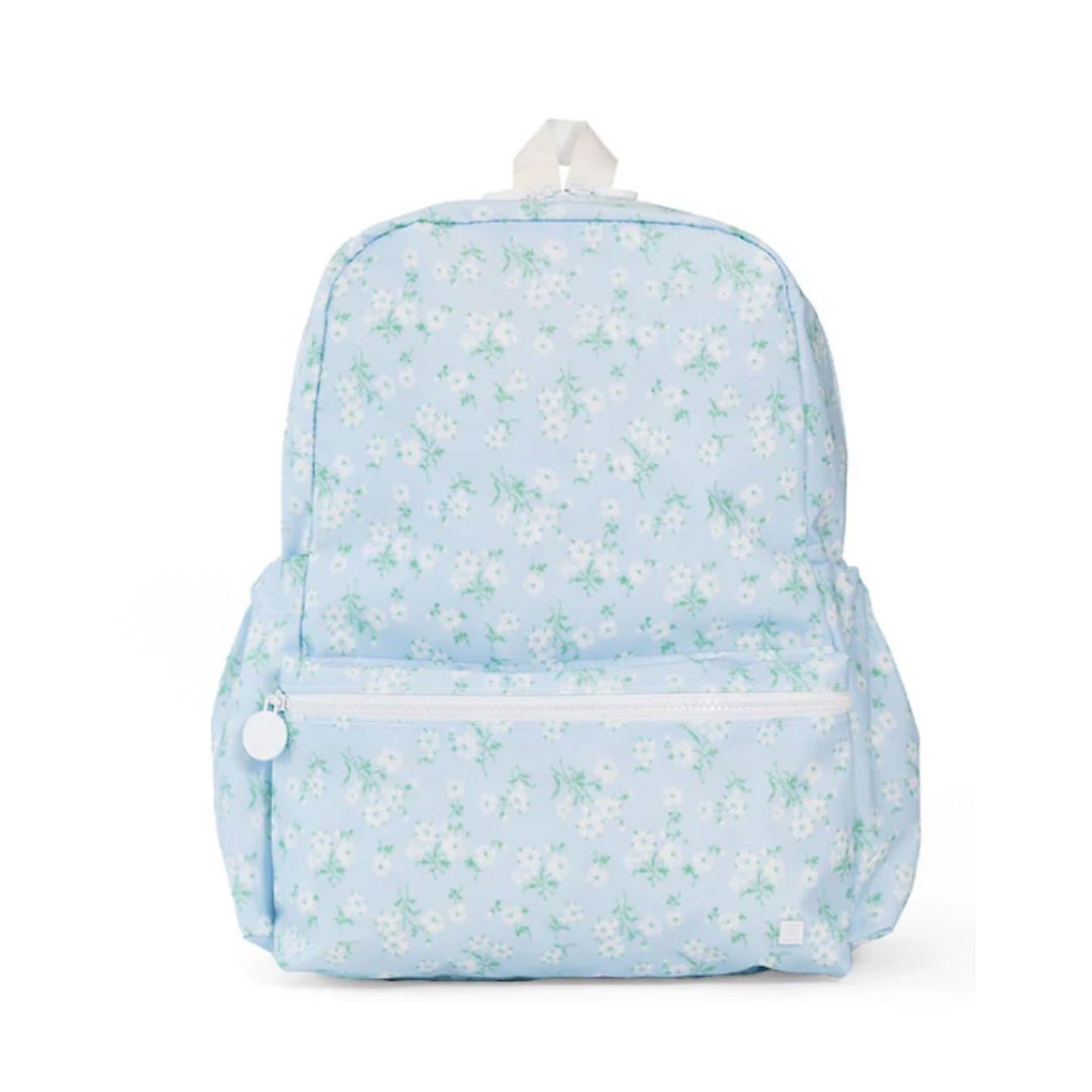 Light blue floral-patterned backpack on a white background
