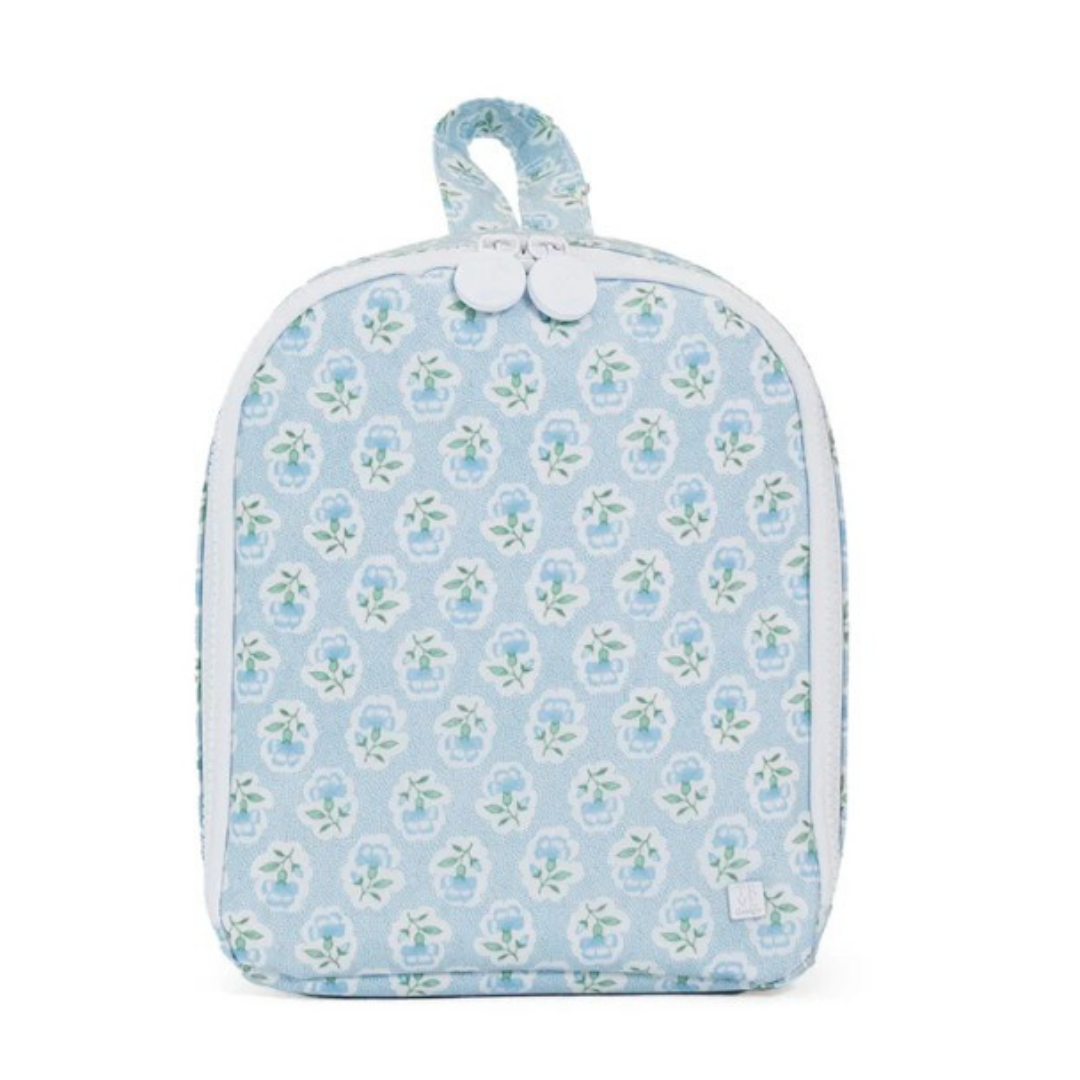 Floral patterned lunch bag on a white background