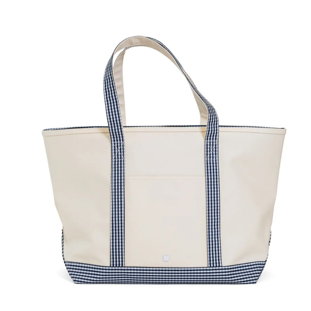 Beige tote bag with blue gingham trim on a white background