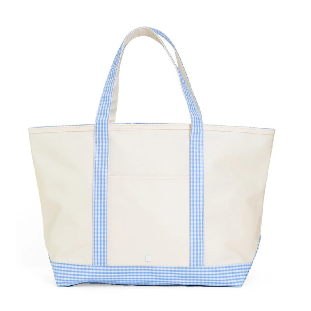 Beige tote bag with blue gingham pattern on a white background
