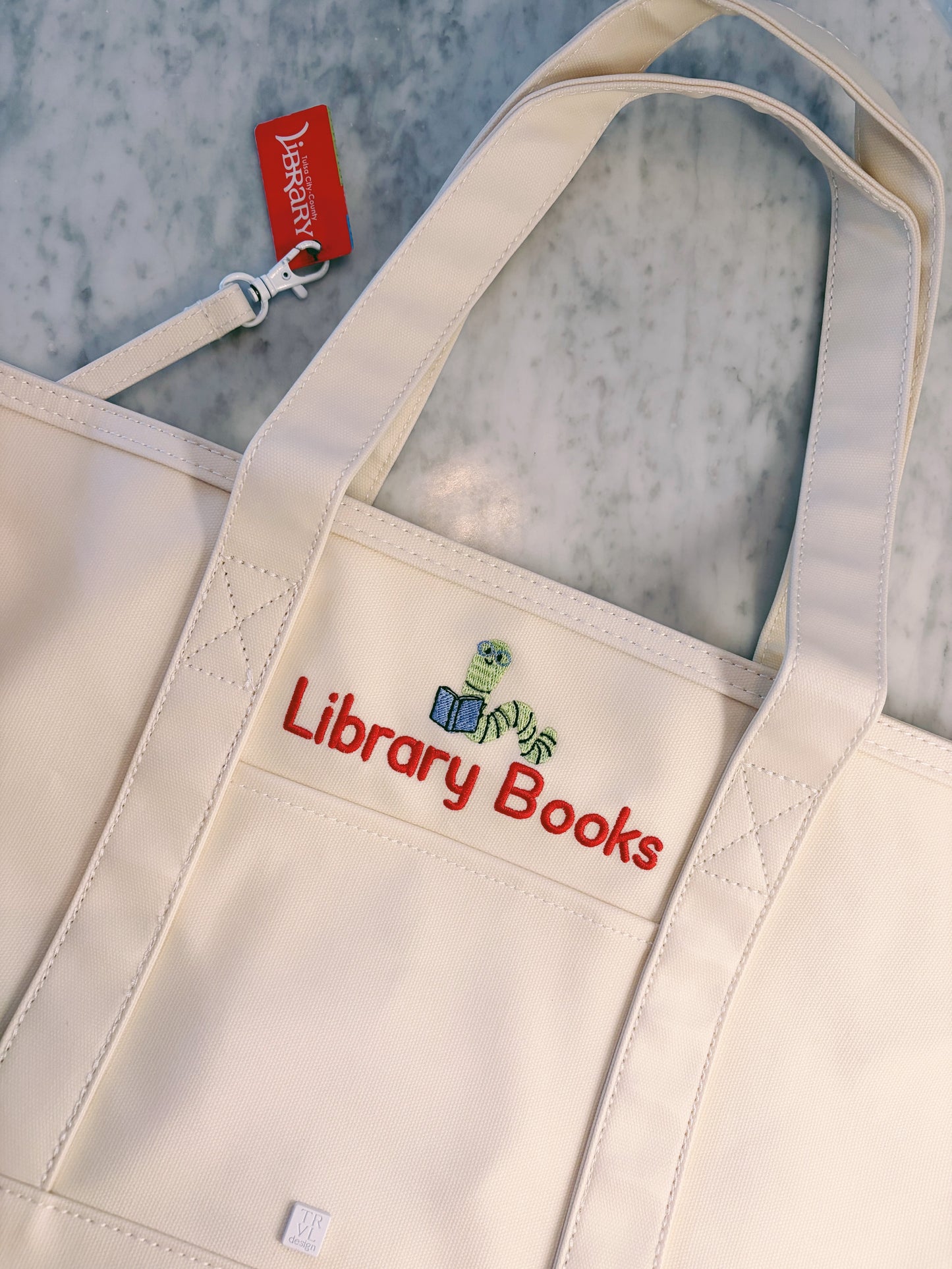 Cream medium canvas coated tote with Library Books and book worm embroidered