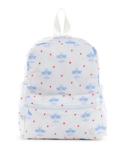 Small backpack with airplane pattern on a white background