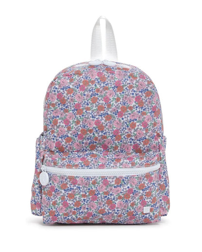 Floral patterned backpack with white accents on a white background