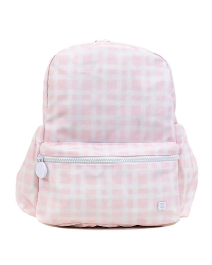 Pink plaid backpack on a white background