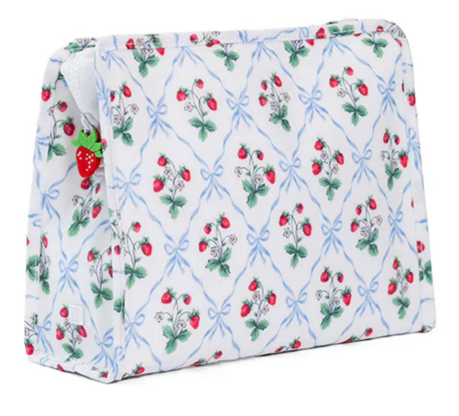 Cosmetic bag with strawberry and bow pattern on a white background
