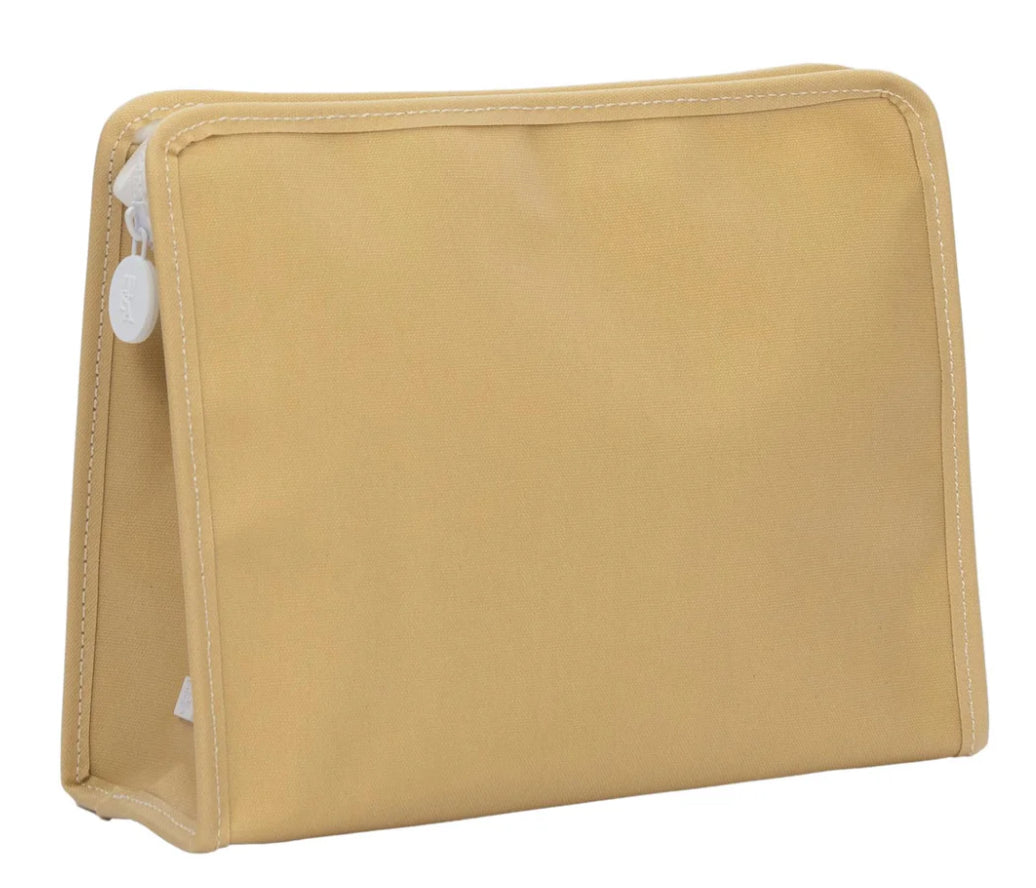 Beige toiletry bag with a white tag on a white background