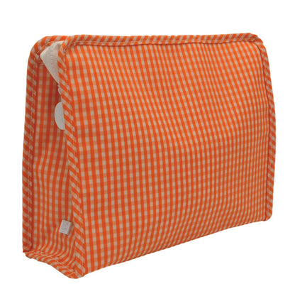 Orange and white checkered pouch on a white background