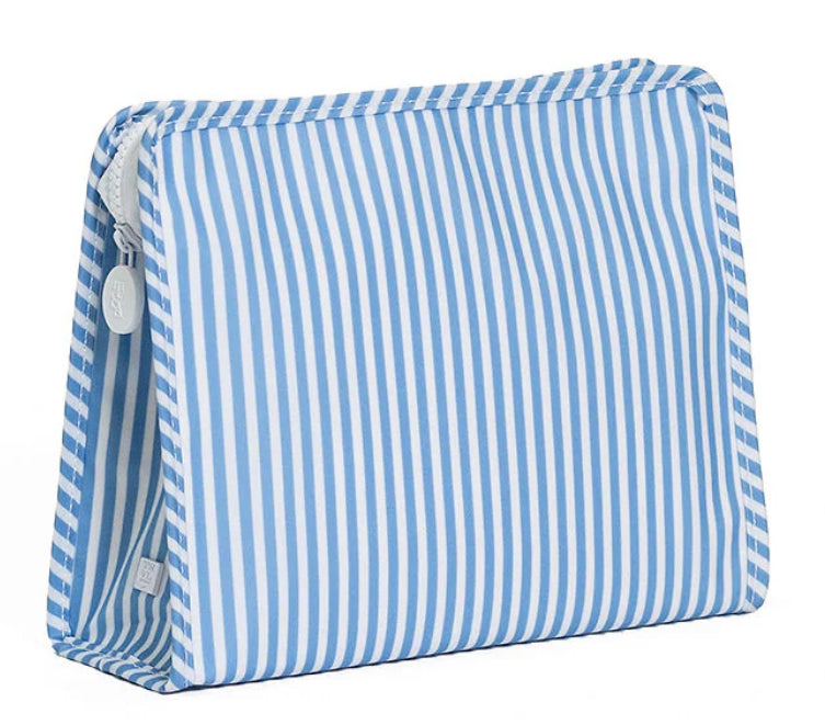 Blue and white striped toiletry bag on a white background