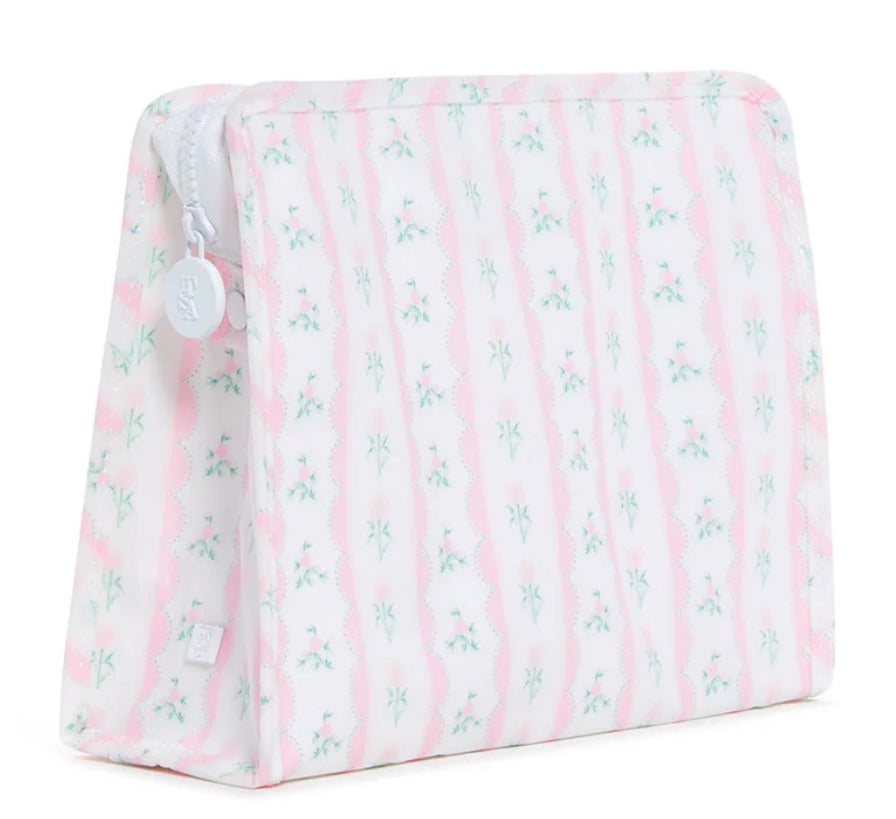 Cosmetic bag with pink and white striped pattern on a white background
