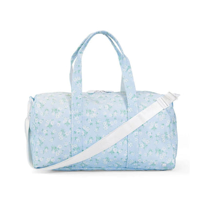 Light blue duffel bag with floral pattern on a white background